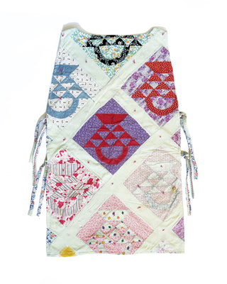 THE QUILTED PINAFORE - PASTEL BASKETS